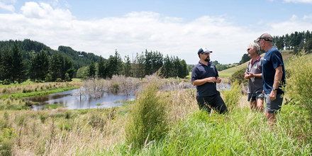 Two men discussing land use in the Bay of Plenty