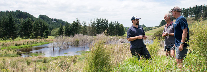 Two men discussing land use in the Bay of Plenty