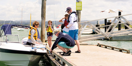 family with lifejackets