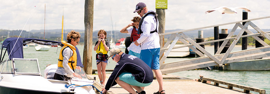 family with lifejackets
