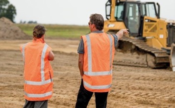 Two men at the Rangitaiki fFoodway earthworks