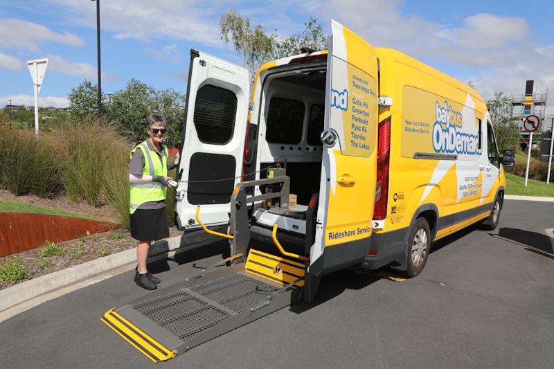 Pauline operating the Baybus OnDemand wheelchair accessible vehicle lift.