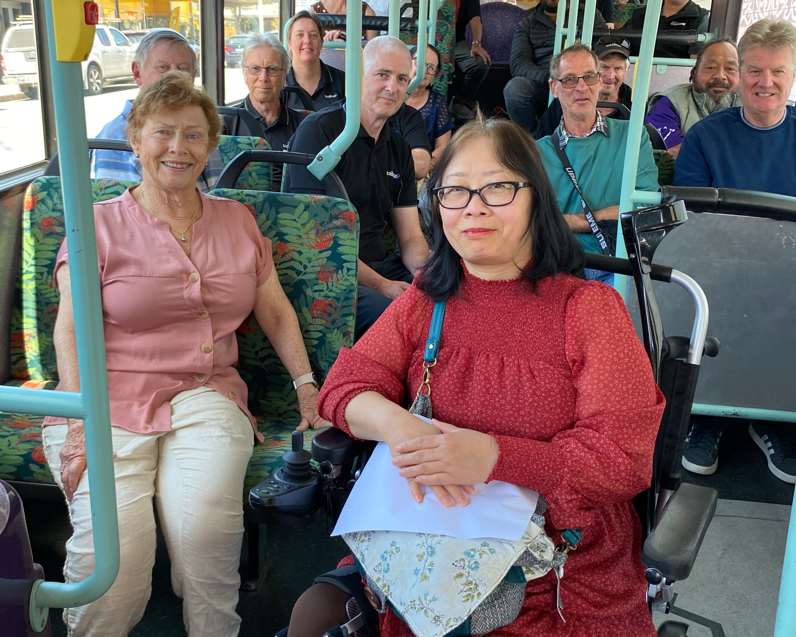 (Front L – R) Wendy Neilson and Yi Small with Uzabus drivers during Disability Awareness Training.