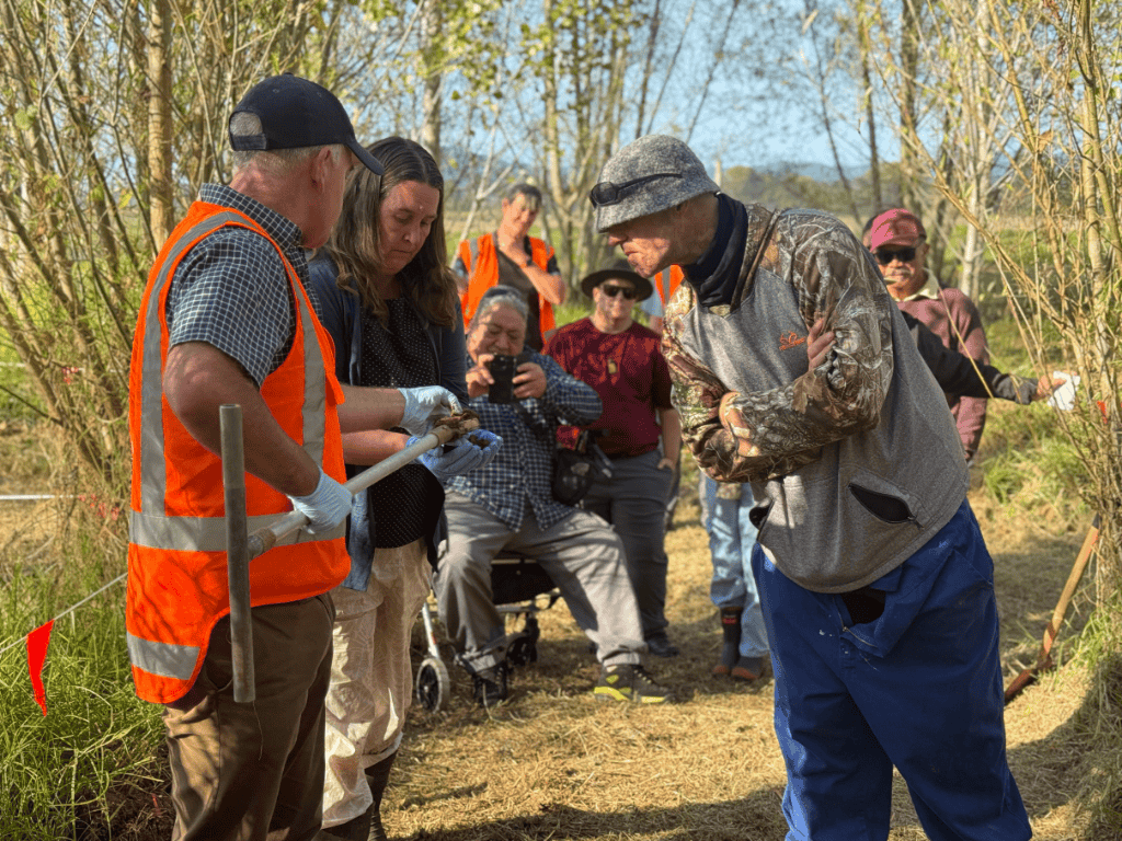People gathered to look at sediment at Kopeopeo canal