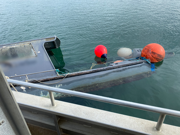 Sunken boat recently recovered from the southern side of the Tauranga Harbour Bridge.
