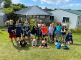 Keen gardeners from Uru Huarākau Whakamārama School who planted a fruit orchard.